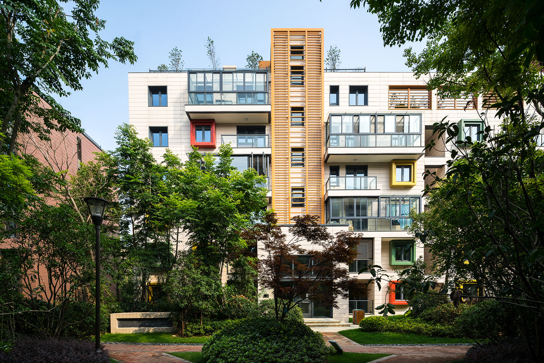 Landsea Eco-Housing in Nanjing, China, a sustainable and culturally-responsive apartment building showcasing internationally recognised green technologies, with a landscaped site, ample recreational facilities, and a design that accommodates extended families.